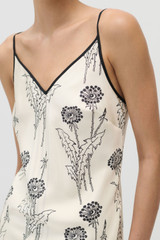 Profile view of model wearing the Oroton Graphic Dandelion Slip Dress in Ecru and 100% Silk Twill for Women . IP:6