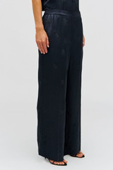 Profile view of model wearing the Oroton Embroidered Leaf Pyjama Pant in Slate and 100% viscose fabric for Women . IP:4