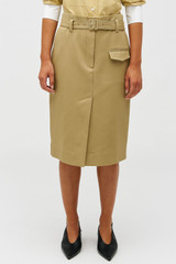 Profile view of model wearing the Oroton Belt Detail Trouser Skirt in Camel and 100% cotton material for Women .