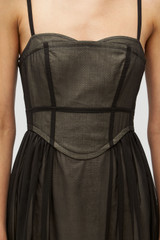 Profile view of model wearing the Oroton Sheer Bodice Dress in Black and 100% cotton material for Women . IP:6