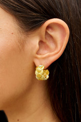 Profile view of model wearing the Oroton Naia Hoops in Worn Gold and Brass material for Women . IP:2