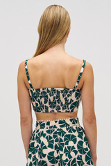 Profile view of model wearing the Oroton Fan Flower Tie Top in Ivy and 100% cotton for Women . IP:6