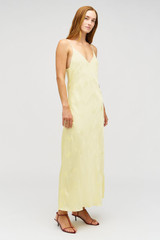Profile view of model wearing the Oroton Embroidered Leaf Slip Dress in Lemon and 100% viscose fabric for Women . IP:4