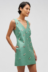 Profile view of model wearing the Oroton Embellished Shift Dress in Mint Leaf and 100% heavy weight linen fabric for Women . IP:4
