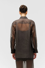 Profile view of model wearing the Oroton Organdy Overshirt in Chocolate and 100% sheer silk organza fabric for Women . IP:5