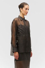 Profile view of model wearing the Oroton Organdy Overshirt in Chocolate and 100% sheer silk organza fabric for Women . IP:4