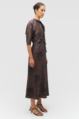 Profile view of model wearing the Oroton Scribble Tree Tie Neck Dress in Chocolate and 100% silk fabric for Women . IP:4