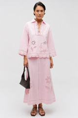 Profile view of model wearing the Oroton Table Cloth Lace Top in Ballet Pink and 48% Cotton 52% Hemp for Women