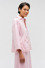 Profile view of model wearing the Oroton Table Cloth Lace Top in Ballet Pink and 48% Cotton 52% Hemp for Women