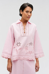 Profile view of model wearing the Oroton Table Cloth Lace Top in Ballet Pink and 48% Cotton 52% Hemp for Women