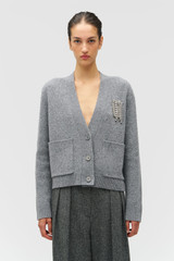 Profile view of model wearing the Oroton Embellished Cardigan in Grey Marle and 100% wool for Women .