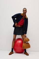 Profile view of model wearing the Oroton Contrast Collar Bomber in North Sea and 100% cotton fabric for Women . IP:2