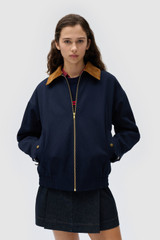 Profile view of model wearing the Oroton Contrast Collar Bomber in North Sea and 100% cotton fabric for Women . IP:3