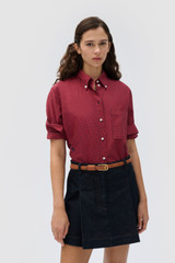 Profile view of model wearing the Oroton MINI GINGHAM SHIRT in Market Red and 100% yarn-dyed cotton fabric for Women