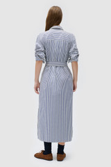 Profile view of model wearing the Oroton WREN STRIPE DRESS in North Sea and 100% yarn-dyed cotton fabric for Women
