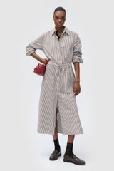 Profile view of model wearing the Oroton WREN STRIPE DRESS in Dark Chocolate and 100% yarn-dyed cotton fabric for Women