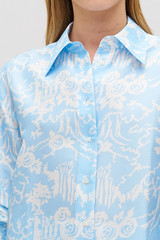 Profile view of model wearing the Oroton Garden Toile Long Sleeve  Shirt in Sky and 100% silk for Women