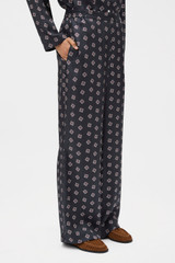Profile view of model wearing the Oroton FOULARD PRINT PJ PANT in North Sea and 100% silk twill fabric for Women