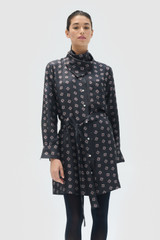 Profile view of model wearing the Oroton Foulard Print Dress in North Sea and 100% silk twill fabric for Women .