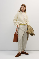 Profile view of model wearing the Oroton Arlo Railroad Pant in Khaki and 100% cotton fabric for Women . IP:2