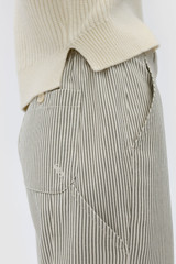 Profile view of model wearing the Oroton Arlo Railroad Pant in Khaki and 100% cotton fabric for Women .