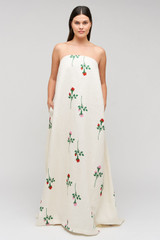 Profile view of model wearing the Oroton Rosebud Gown in Antique White and 100% linen material for Women