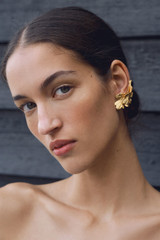 Profile view of model wearing the Oroton Oak Earrings in Worn Gold and Premium brass material for Women . IP:3