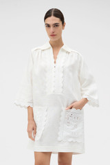 Profile view of model wearing the Oroton Handkerchief Tunic Dress in Antique White and 100% mid-weight linen fabric for Women . IP:3