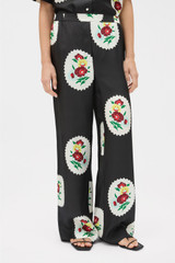 Profile view of model wearing the Oroton Folk Doilie Print Pyjama Pant in Black and 100% silk twill fabric for Women . IP:3