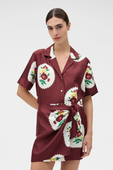 Profile view of model wearing the Oroton Folk Doilie Camp Shirt in Burgundy and 100% silk twill fabric for Women . IP:2