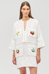Profile view of model wearing the Oroton Embroidered Tunic Dress in Antique White and 100% linen for Women .