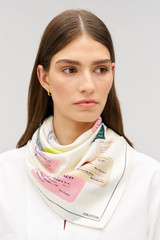 Profile view of model wearing the Oroton Invitation Silk Scarf in Ecru and Silk fabric for Women