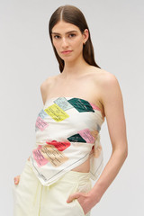 Profile view of model wearing the Oroton Invitation Silk Scarf in Ecru and Silk fabric for Women
