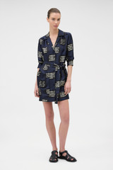 Profile view of model wearing the Oroton Marine Fish Tunic Dress in NORTH SEA and 100% lightweight, fluid silk twill fabric with a fine weave for Women . IP:6