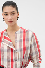 Profile view of model wearing the Oroton Shadow Check Long Sleeve Shirt in MARKET RED and 100% silk dupion fabric for Women . IP:3