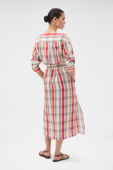 Profile view of model wearing the Oroton Shadow Check Shirt Dress in MARKET RED and 100% silk dupion fabric for Women .