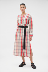 Profile view of model wearing the Oroton Shadow Check Shirt Dress in MARKET RED and 100% silk dupion fabric for Women .