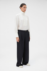 Profile view of model wearing the Oroton Silk Belt Detail Pant in Black and 100% silk fabric for Women . IP:3