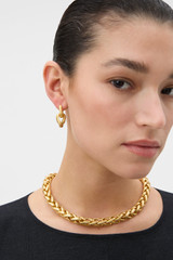 Profile view of model wearing the Oroton Romy Earrings in Worn Gold and Premium brass material for Women . IP:2