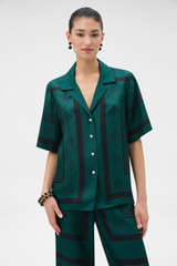 Profile view of model wearing the Oroton SPOT SCARF BELT CAMP SHIRT in HELM GREEN and 100% silk twill fabric for Women . IP:2