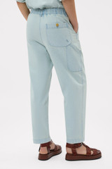 Profile view of model wearing the Oroton Arlo Carpenter Chino in Chambray and 100% cotton fabric for Women
