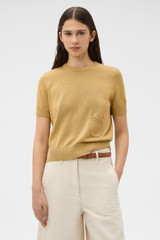 Profile view of model wearing the Oroton Cotton Short Sleeve Knit in Cashew and 100% cotton fabric for Women . IP:2