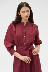 Profile view of model wearing the Oroton Weekend Shirt Dress in Rouge and 100% cotton fabric for Women . IP:4