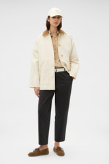 Profile view of model wearing the Oroton Cotton Chore Jacket in Calico and 100% cotton fabric for Women . IP:7