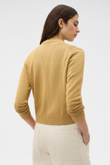Profile view of model wearing the Oroton Cotton Knit Cardigan in Cashew and 100% cotton fabric for Women . IP:5