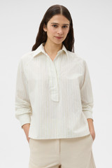 Profile view of model wearing the Oroton Placket Detail Shirt in Calico and 100% cotton fabric for Women . IP:2