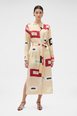 Profile view of model wearing the Oroton Vintage Label Column Dress in Nougat and 100% silk twill fabric for Women . IP:2
