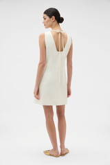 Profile view of model wearing the Oroton Bow Detail Shift Dress in Soft Cream and 100% linen fabric for Women . IP:5