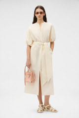 Profile view of model wearing the Oroton Grace Popover Dress in Calico and 100% cotton poplin fabric for Women . IP:6