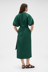 Profile view of model wearing the Oroton Grace Popover Dress in Helm Green and 100% cotton poplin fabric for Women . IP:5